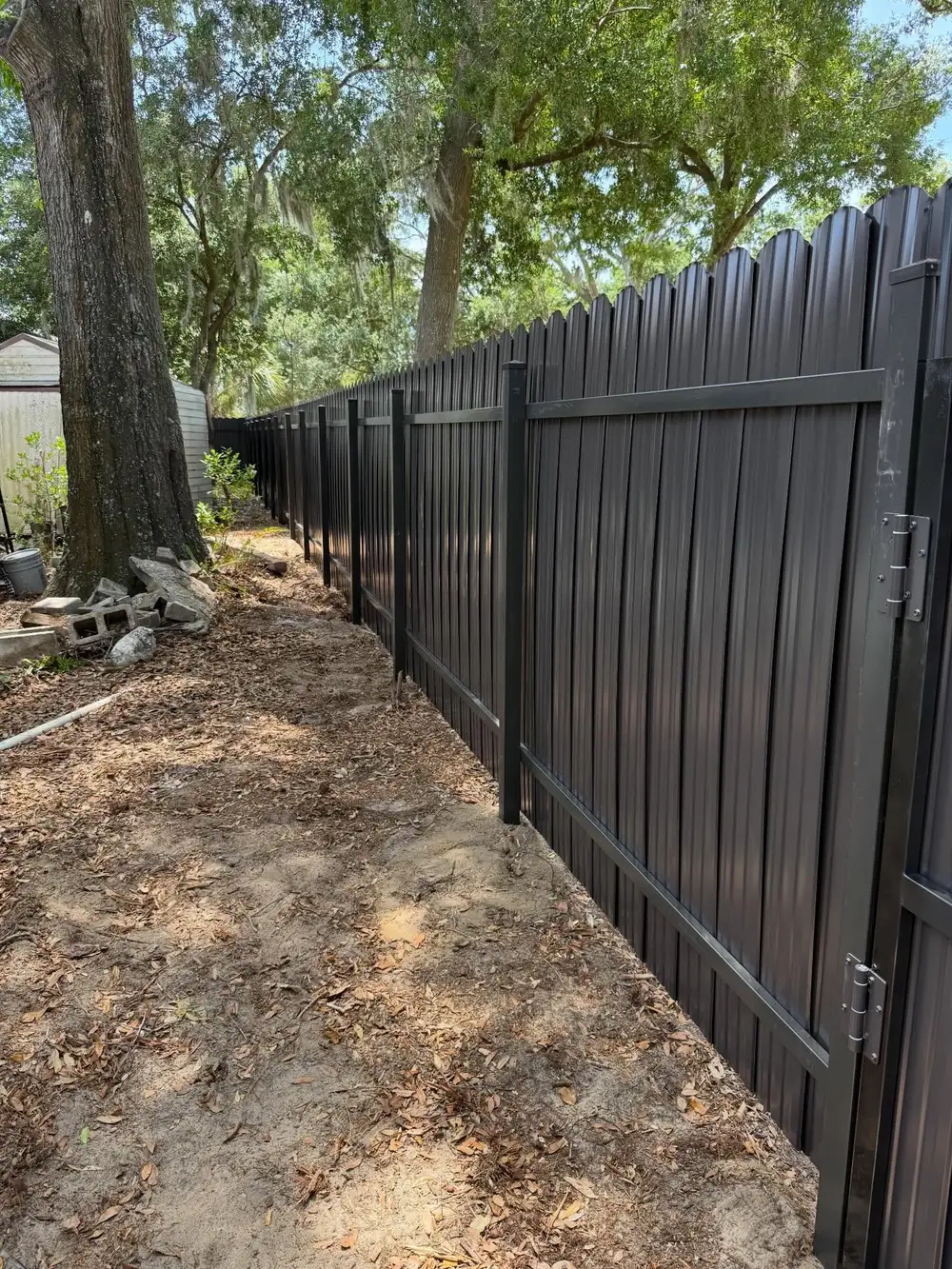 Fence company Riverview, FL — new fence posts being installed
